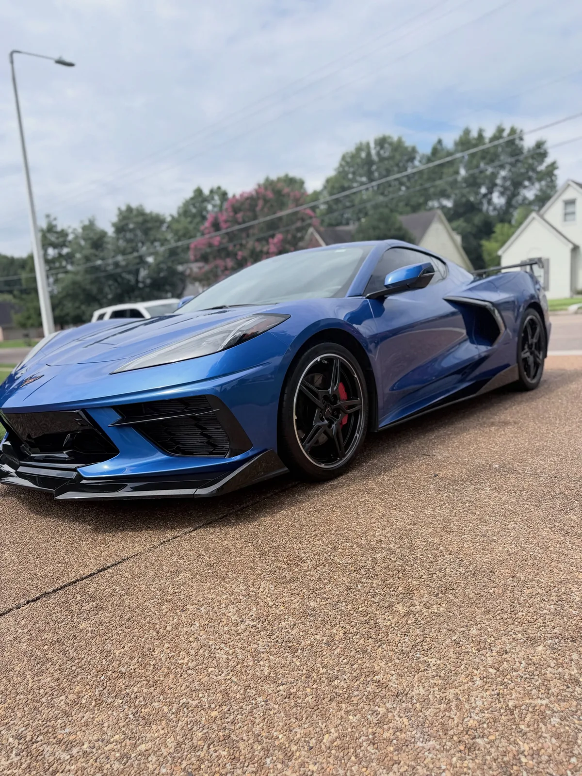 A blue Chevrolet Corvette C8 detailed to a high gloss