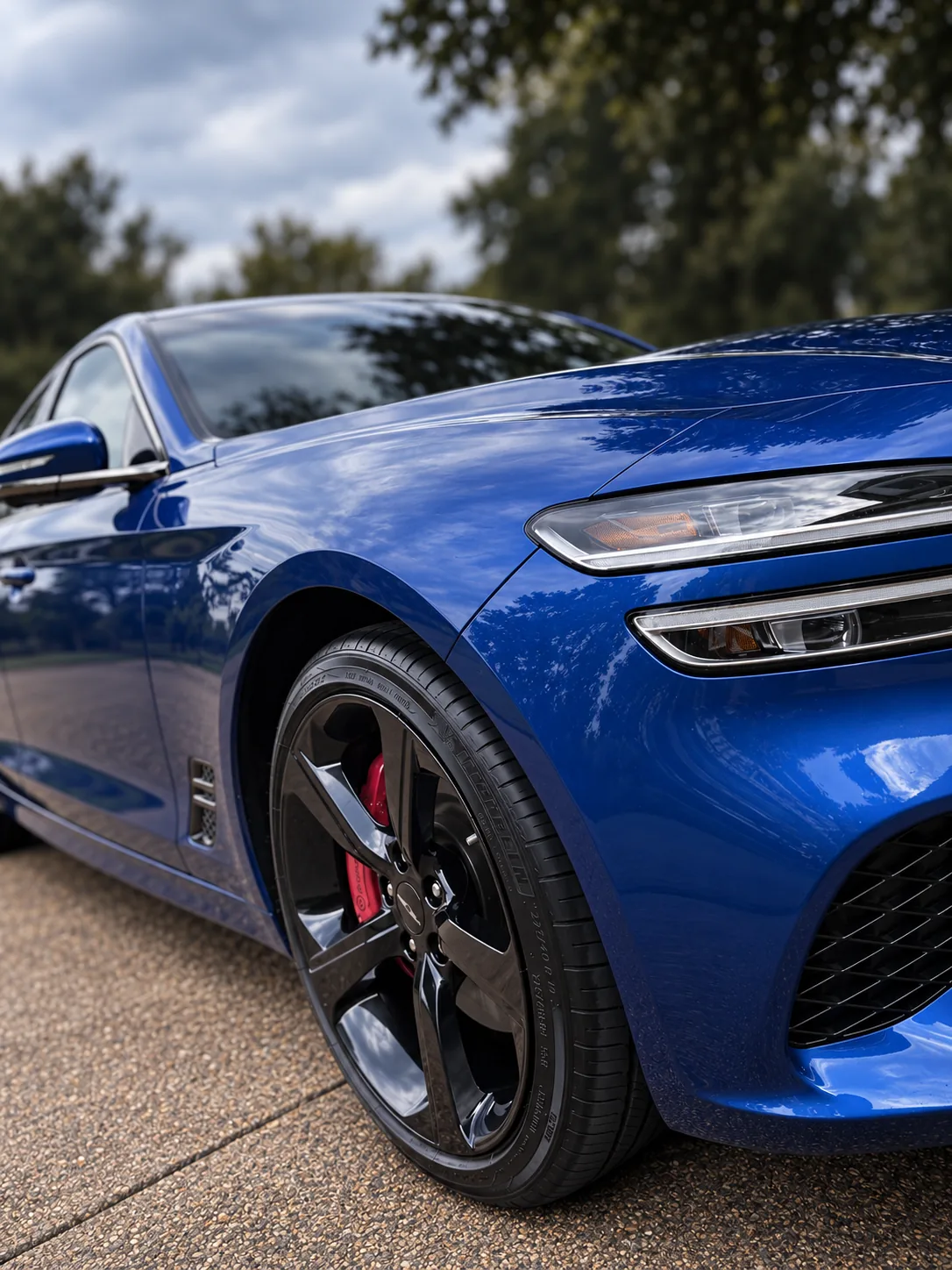 A Genesis G70 sport sedan after a full exterior detail